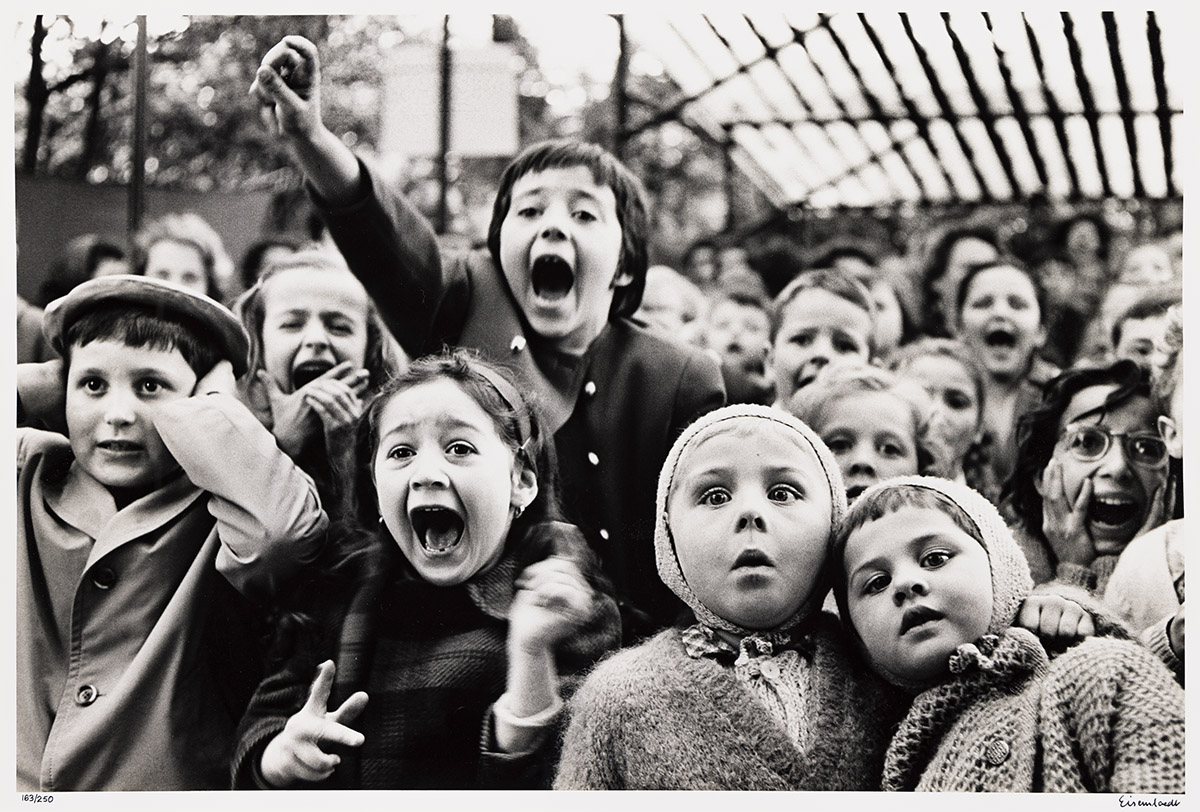 ALFRED EISENSTAEDT (1898-1995) Children at a Puppet Theater, Paris.
